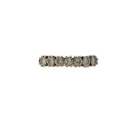 An 18ct seven stone diamond ring