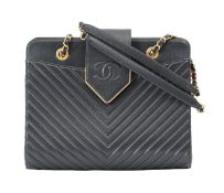 A Chanel 'Boy' navy leather shoulder bag