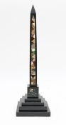 A Victorian Ashford black marble obelisk