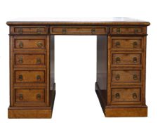 A walnut twin pedestal desk