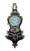 A Louis XV style French cartel clock