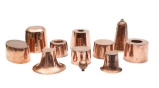 A group of eleven Victorian copper jelly moulds