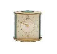 A Jager gilt metal miniature travelling clock