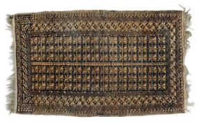A hand knotted Belouch prayer rug