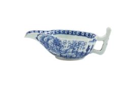 An English blue and white porcelain sauceboat
