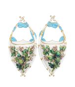 A pair of English porcelain wall pockets