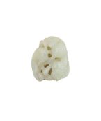 A Chinese pale green jade pendant of two shishi