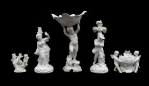 A group of continental white glazed figures