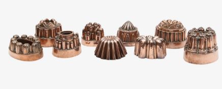 A group of nine Victorian copper jelly moulds