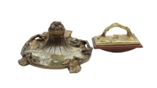 An Art Nouveau style gilt brass inkwell and blotter