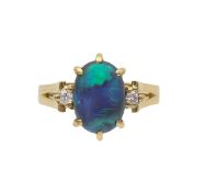 A black opal and diamond dress ring