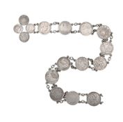 A silver coin belt