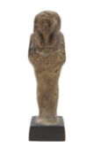 An Egyptian moulded faience shabti