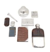 A collection of silver desk items