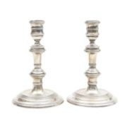 A pair of modern silver candlesticks