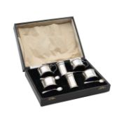 A cased George VI silver cruet set