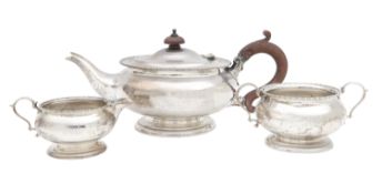 A George V silver three piece tea service