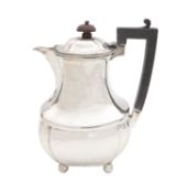 An Edward VII silver hot water pot