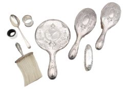 A group of silver dressing table items