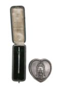 A Victorian silver heart-shaped box and needle