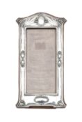 An Art Nouveau silver mounted photograph frame