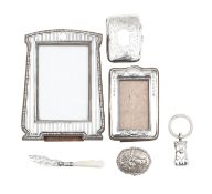 A group of silver items