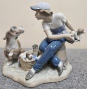 Lladro Glazed Ceramic Figure Group Depicting a Boy With Dogs. Approx. 18cms H reasonable used