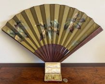 PAIR OF WHITE METAL EARRINGS DEPICTING ORIENTAL DEITIES, PLUS JAPANESE FAN