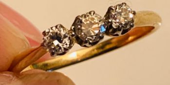 18ct GOLD RING SET WITH THREE DIAMONDS APPROX 0.2ct, SIZE N+ AND TOTAL WEIGHT APPROX 2.15g