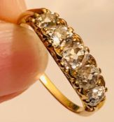 UNMARKED GOLD COLOURED RING SET WITH OLD MINE CUT DIAMOND APPROX 0.5ct, TWO DIAMONDS APPROX 0.25ct