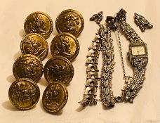METAL AND MARCASITE WATCH, THREE STONES MISSING AND ONE BROKEN STONE, WORKING; SILVER COLOURED METAL