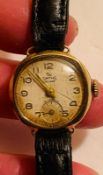 UNMARKED GOLD COLOURED SMITH DELUX 15 JEWEL LADIES WATCH, RARE, IN WORKING ORDER