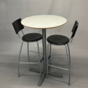 CIRCULAR TABLE & STOOLS.