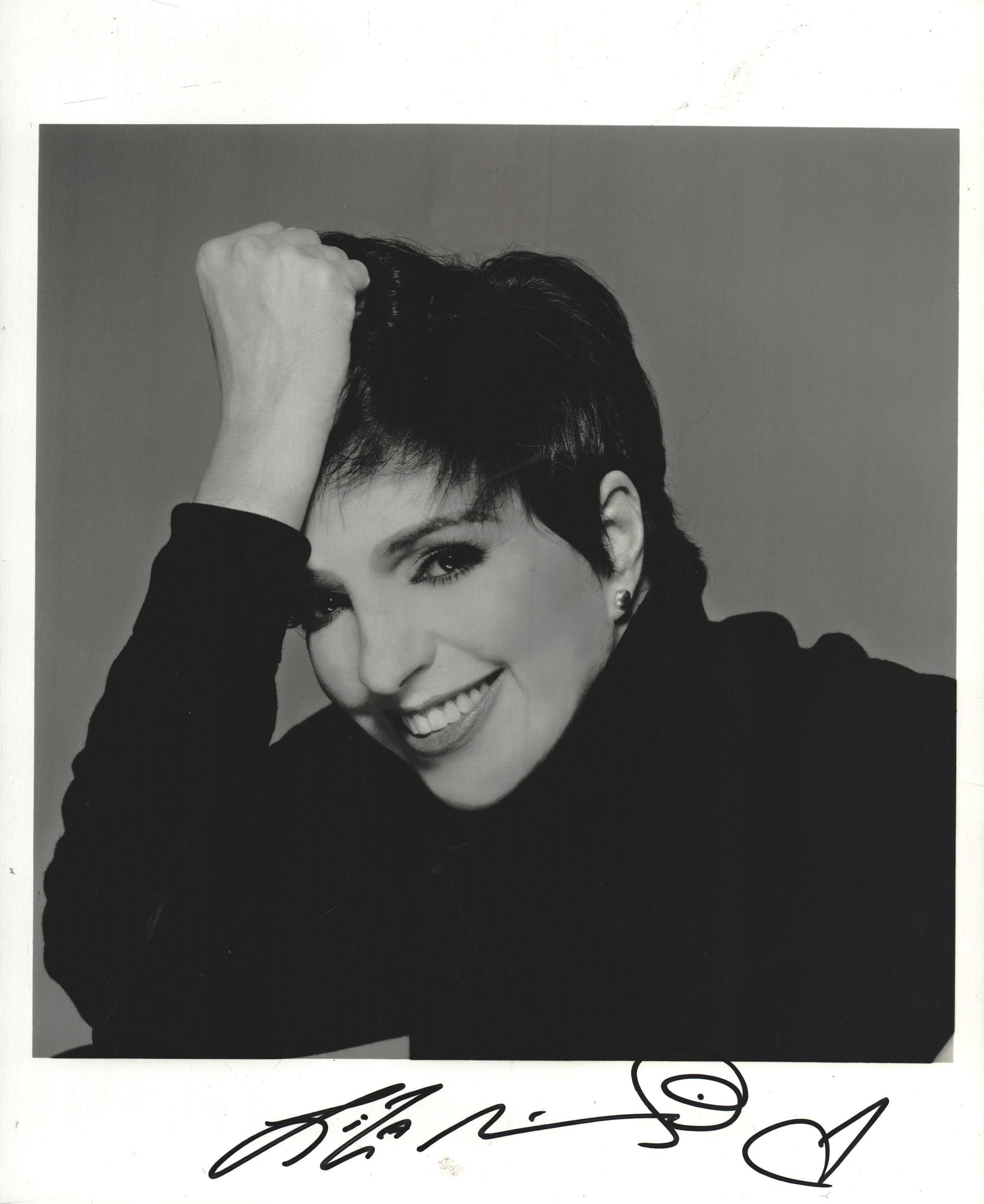 Liza Minelli signed 10x8inch black and white photo.