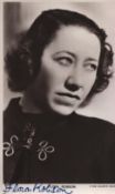 Flora Robson signed 6x4inch black and white postcard photo.