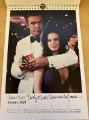 007 Bond Girls Calendar signed by 12 Bond girls - 2025 calendar signed to each months Bond movie