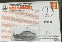 Royal Navy Lt Cdr T.J. Lewis signed HMS Grimsby comm the commissioning of the Single Role Minehunter
