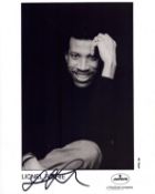 Lionel Richie signed 10x8inch black and white photo.