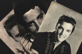 Collection of 3 Elvis Presley black & white 8x10 photographs. 1 with printed signature.
