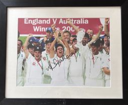 Michael Vaughan signed and framed colour photograph of the England cricket team celebrating their