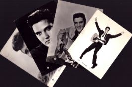 Collection of 4 Elvis Presley black & white photographs. Unsigned.