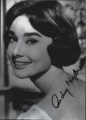 Audrey Hepburn signed 7x5inch black and white photo.