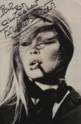 Brigitte Bardot signed 12x8inch black and white photo.