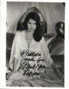 Maud Adams signed 10x8inch black and white photo. Dedicated.