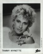 Tammy Wynette signed 10x8inch black and white promo photo.