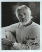 Kenny Rogers signed 10x8inch black and white photo.