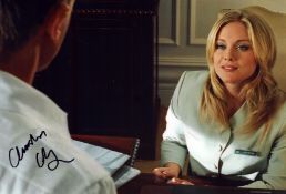 Christina Cole signed Casino Royale 12x8inch colour photo.
