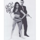 Martine Beswick signed 10x8inch black and white photo.