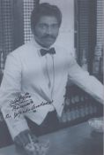 Albert Moses signed 12x8inch black and white photo.