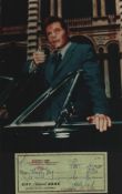 Jack Lord signed cheque with accompanying 10x8inch colour photo.